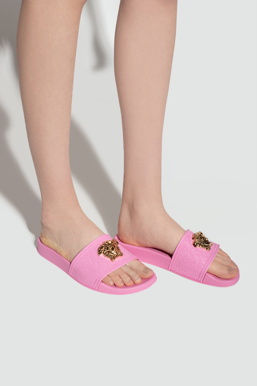 Pink Palazzo slides with appliqu Versace IetpShops Germany